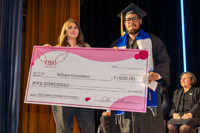 Ella Shahbazian presenting the Ella's Angels scholarship check to William Guandique